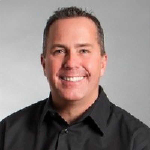 Headshot of Paul Freeman, Managing Partner and the Chief Development Officer at PulseOne