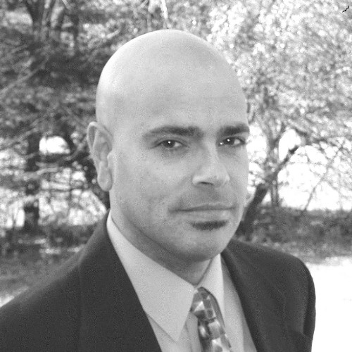 Black and white headshot of Dr. David Celiberti