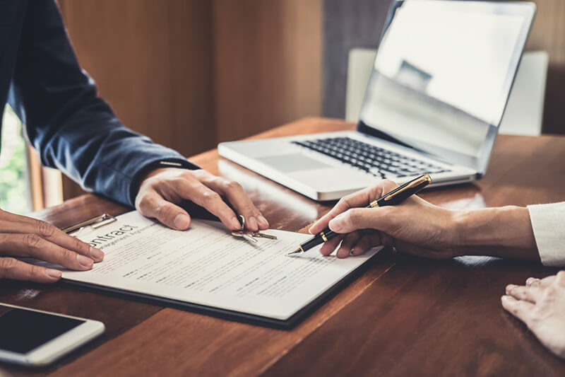 sales manager filing keys to customer after signing rental lease contract of sale purchase agreement t20 98rngB