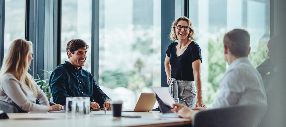 Business people having casual discussion during meeting