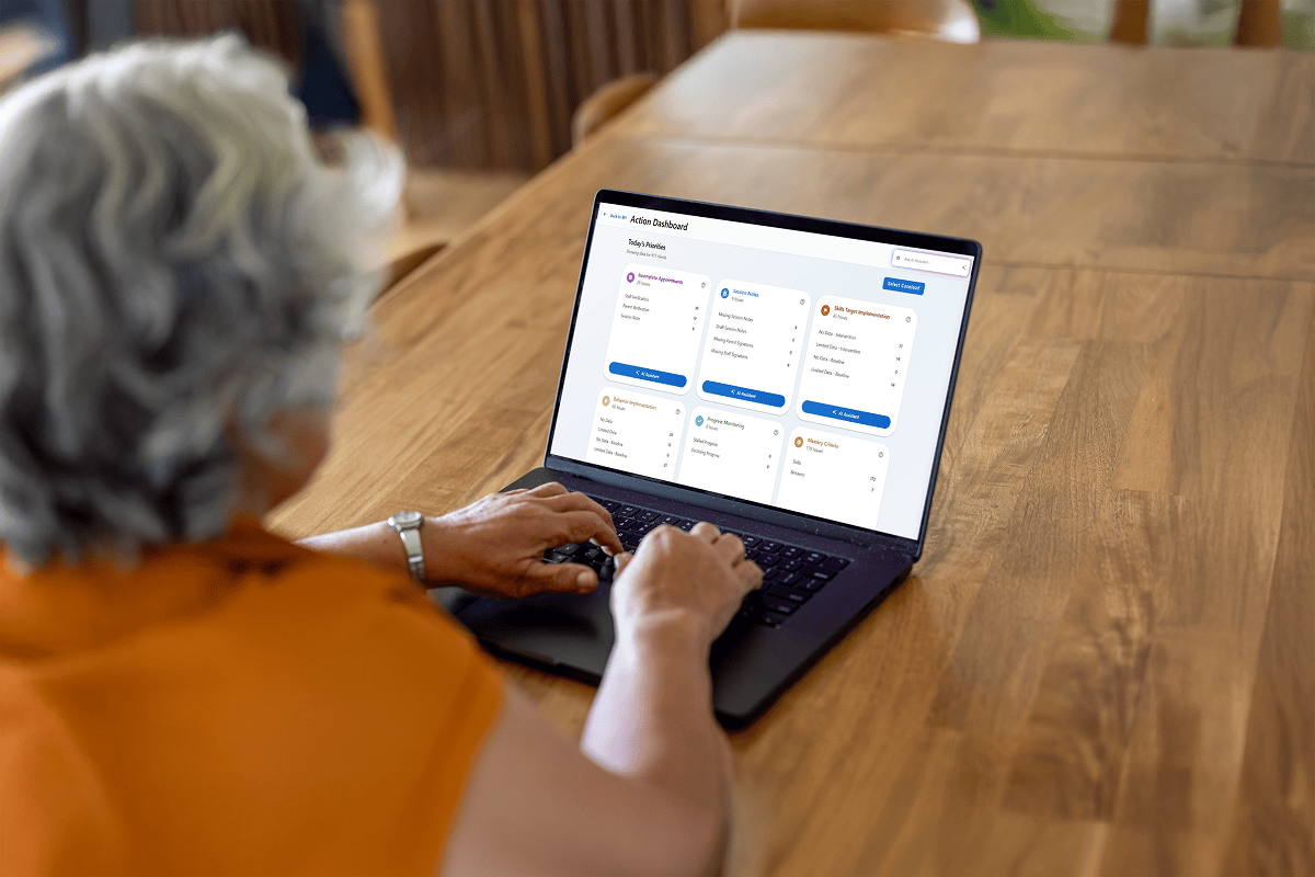 Person-Using-Laptop-with-Action-Dashboard-for-Task-Management