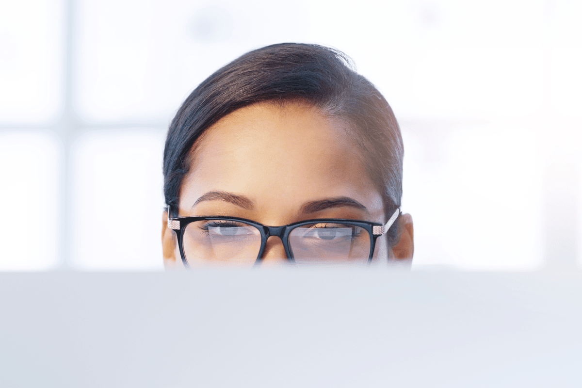 Doctor or analyst carefully examining healthcare data on screen